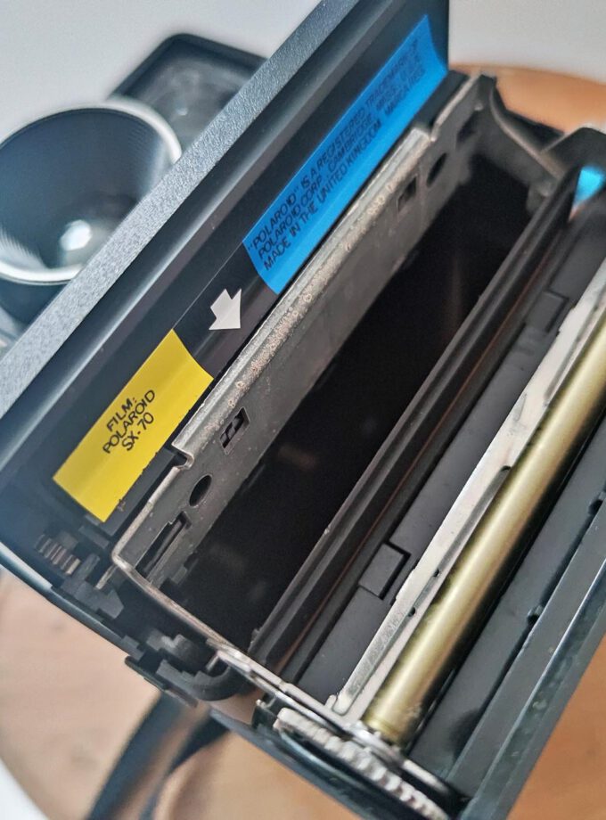 Polaroid Land Camera Revue Blue Button