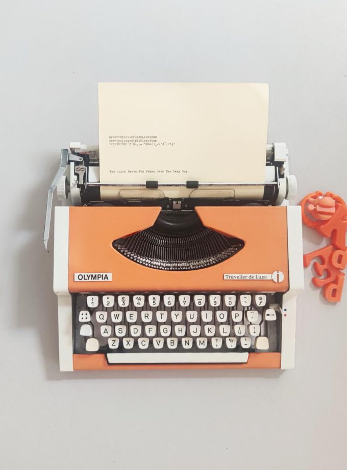 Vintage Olympia Traveller Orange Typewriter