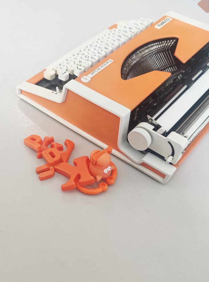 Vintage Olympia Traveller Orange Typewriter