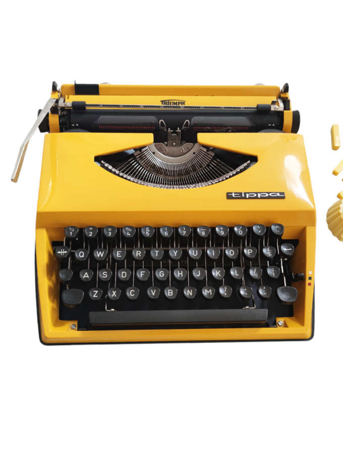 Vintage Tippa Triumph Typewriter Yellow