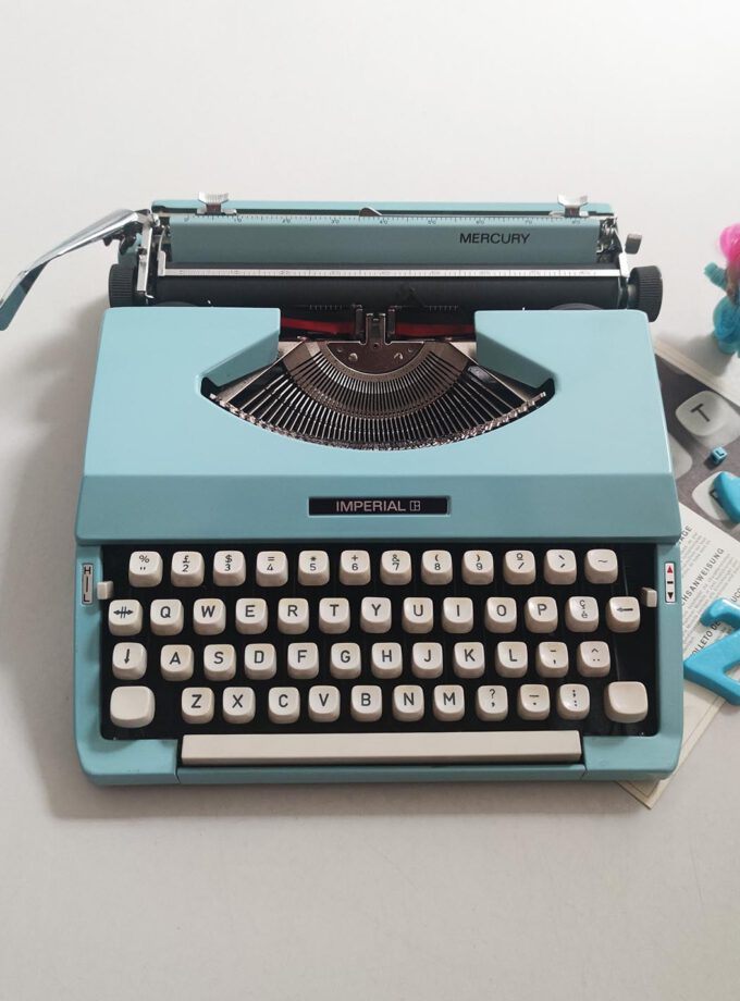 Vintage Baby Blue Imperial Typewriter