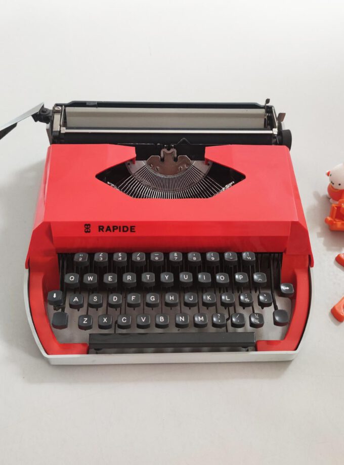 Vintage Rapide Orange Typewriter