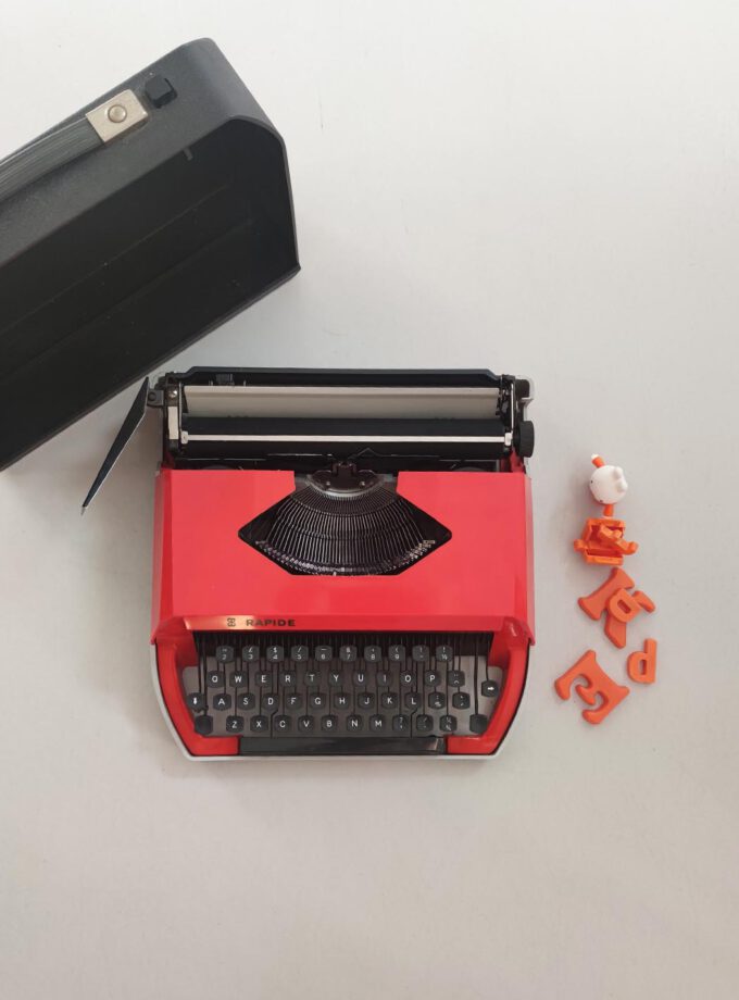 Vintage Rapide Orange Typewriter