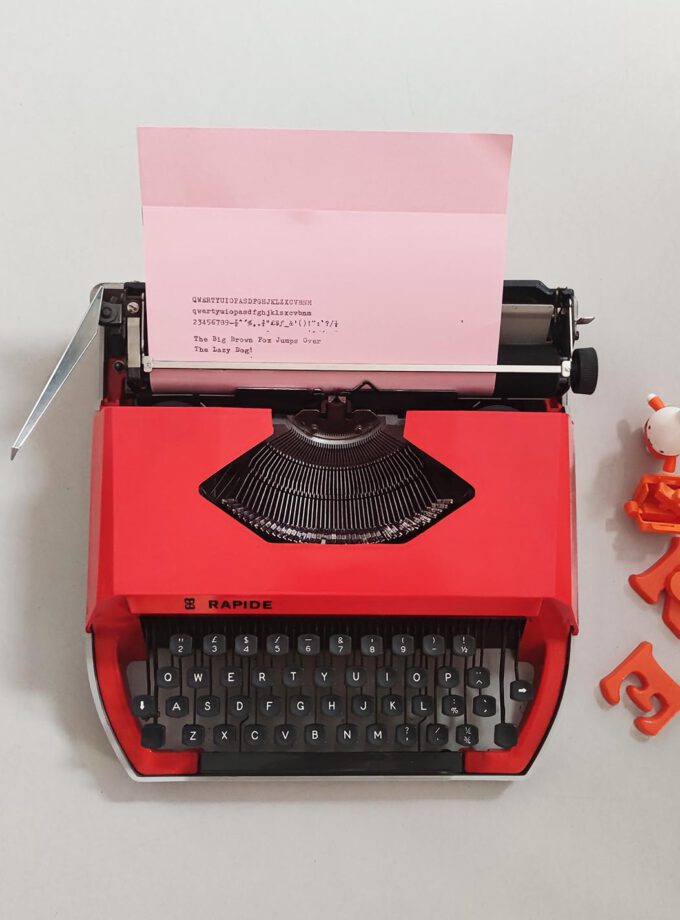 Vintage Rapide Orange Typewriter